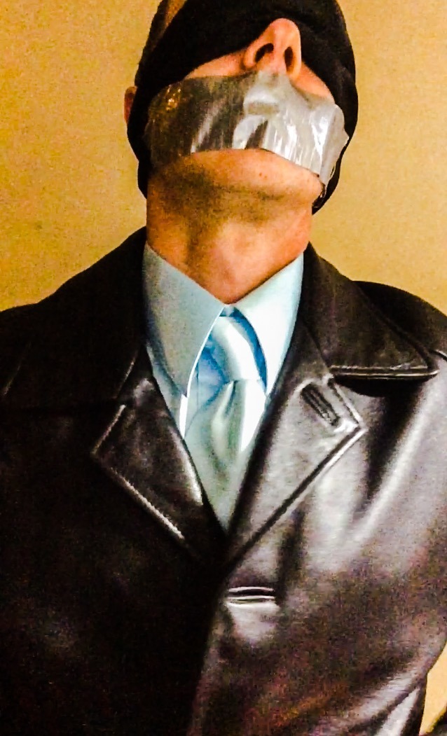 kinkedlink:  Satin dress shirt /tie, leather jacket and of course…tape  