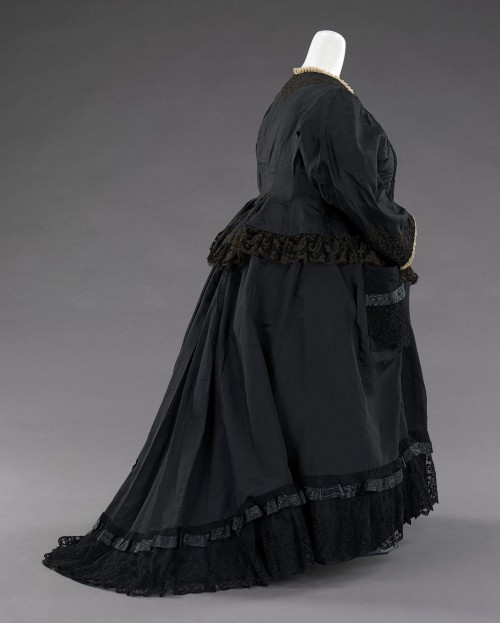 longliveroyalty:Dress of Queen Victoria of the United Kingdom worn in the four generations photograp