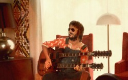 older-soul:Eric Clapton with double neck