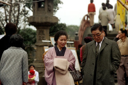 17-635 by nick dewolf photo archive on Flickr.tokyo, japan 1973 people strolling near footbridge kameido tenjin shrine