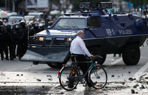 queeranarchism:  60 year old historian Martin Bühler (who identified himself to the press, I do not identify activists without consent) appears to ‘photobomb’ a lot of media images of the G20 in Hamburg. In reality he is a long time observer documenting