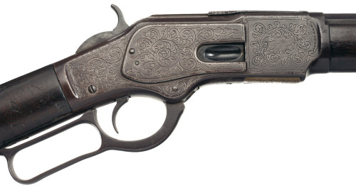 An engraved and leather mounted Winchester Model 1873 lever action rifle inscribed to Judge Roy Bean