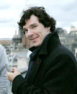 thescienceofjohnlock:  fancypantswatson:  ewmartin:  i’d like to pretend that john took this picture when sherlock was in a good mood one day. he made some stupid joke then when sherlock was smiling, called his name and snapped this. he had it printed