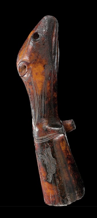 An Okvik ivory figure,St. Laurence Island, Northwest Coast, circa 200 B.C. - 100 A.D.This figure is 
