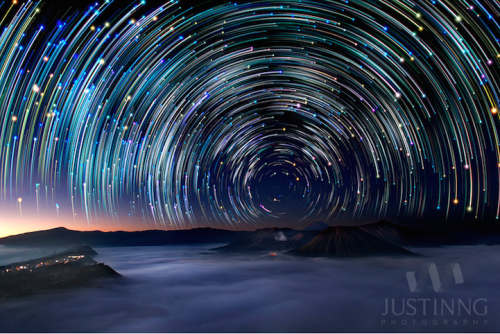 mymodernmet:  Singapore-based photographer Justin Ng captures absolutely breathtaking photos of the night sky, including these dazzling composite images of star trails curving over various landscapes. 