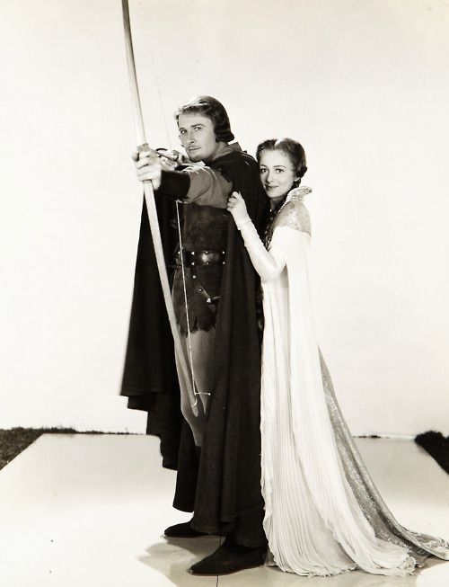 diverso-blog: Olive & Errol in The Adventures of Robin Hood (1938)Image via Pinterest