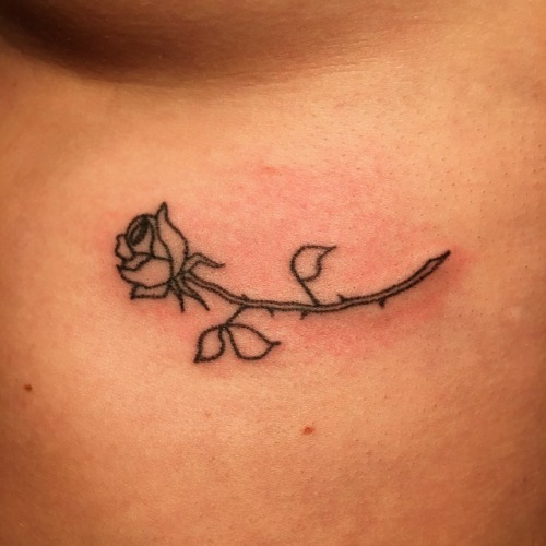 Oh hey I did a stick and poke! Underbooby rose!