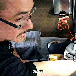 rdjgifsdaily: Robert getting his new tattoo | Robert tattooing Joshua Lord.
