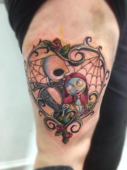 fouracestattoo:  Tattoo by Mark Stewart of Four Aces Tattoo in Aldinga Beach, South Australia. Jack and Sally from The Nightmare Before Christmas movie. Please excuse the left over sharpie from the parts of the tattoo that were freehanded on first. Thanks