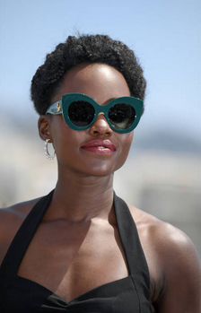 directedbybjenkins:   Lupita Nyong'o attends the photocall for ‘355’ during the