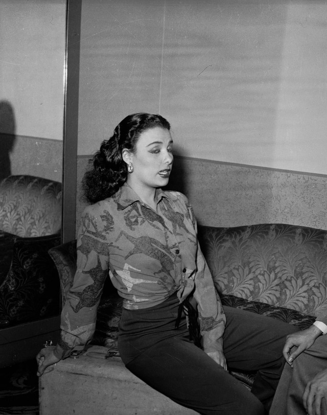 Lena Horne photographed by Charles Harris backstage at Stanley Theatre in Pittsburgh, 1944.