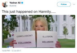 micdotcom:  Kellyanne Conway held up signs