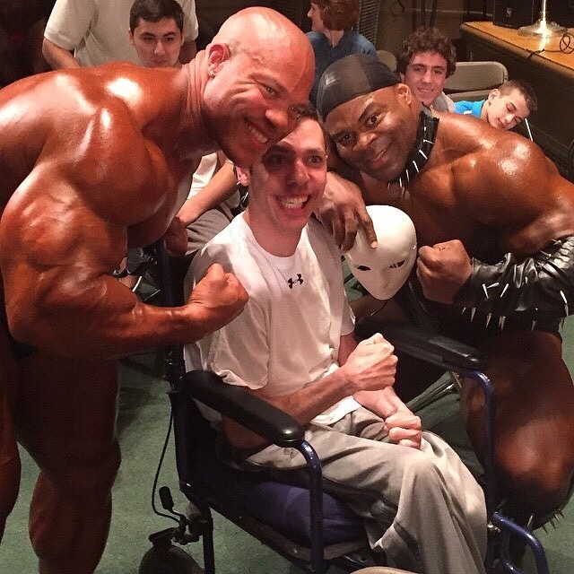 Phil Heath &amp; Kai Greene with a fan.