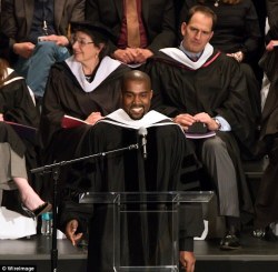 thisishiphoplifestyle:  Kanye West receiving his honorary Doctorate in Chicago.  “Hey Mama, I know act a fool, but I promise you I’m going back to school”.