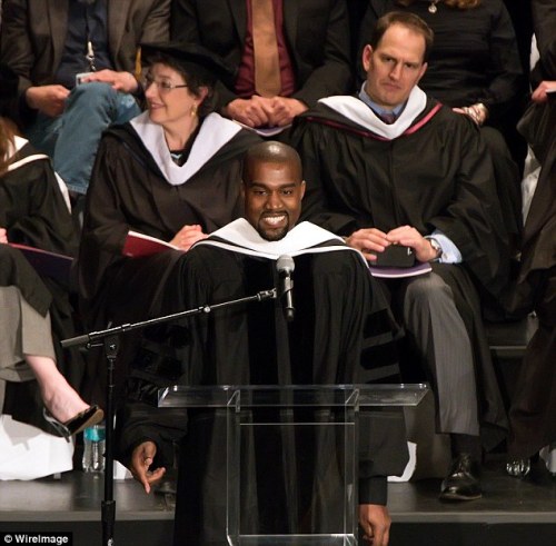 thisishiphoplifestyle:  Kanye West receiving his honorary Doctorate in Chicago.  “Hey Mama, I know act a fool, but I promise you I’m going back to school”.