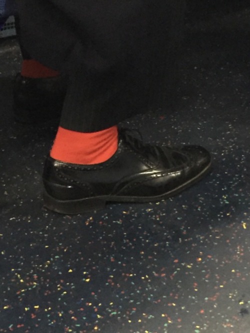 Daddy on the bus at Charring Cross. Love the red socks - very daring!