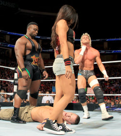 fishbulbsuplex:  Dolph Ziggler, A.J. Lee and Big E. Langston  I&rsquo;d love to see a hot foursome break out in the ring here!