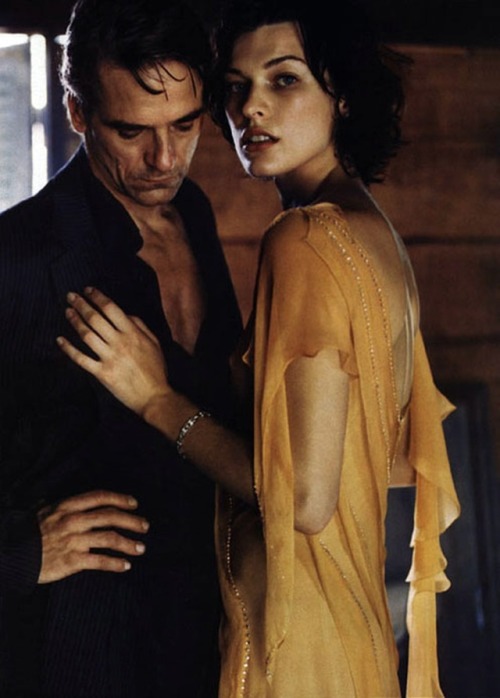 filmloversareverysickpeople:Jeremy Irons e Milla Jovovich by Mikael Jansson