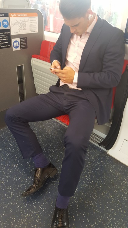 suitman89:  Manspreading on the train, showing off his suited bulge…  what a beauty.his arse 