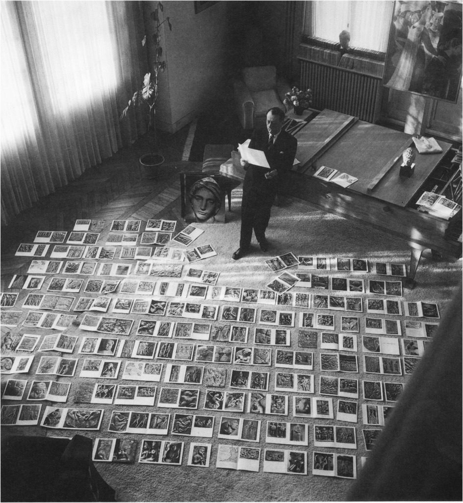 thegreatinthesmall:    André Malraux selecting photographs for the Imaginary Museum