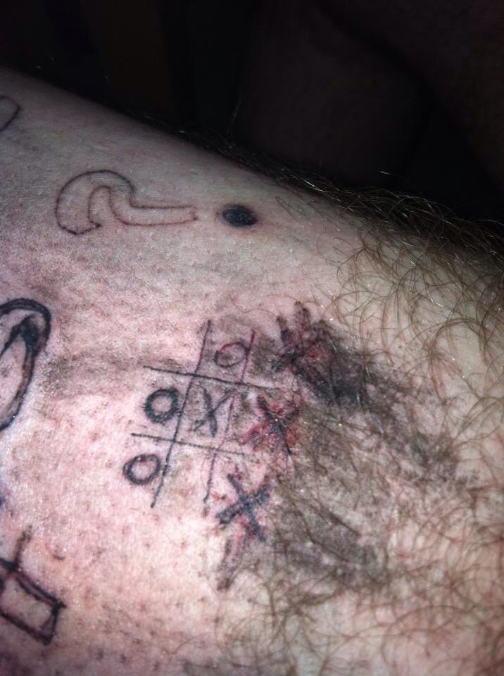 fuck no bad tattoos: the original bad tattoo blog — This is a guy who  decided to play tic tac toe with...