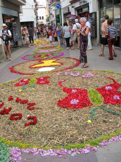 Happy International women&rsquo;s day! Flower petal carpets in Tossa de Mar.Catalonia, Spain.&nb