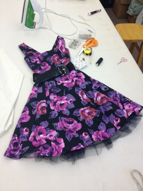 Alteration of a shop bought dress for a school play. First of all we took the dress down a size then