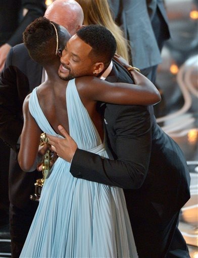 madschristoph:  Lupita is literally living the dream with all of that man candy.