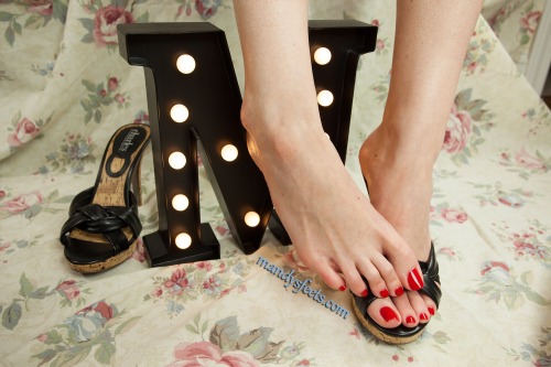 Shiny red toes in sexy mules More on my free blog at mandysfeets.com