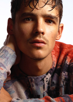 meninvogue:Brenton Thwaites photographed by Cuneyt Akeroglu for Wonderland magazine. Brenton wears Jumper Prada