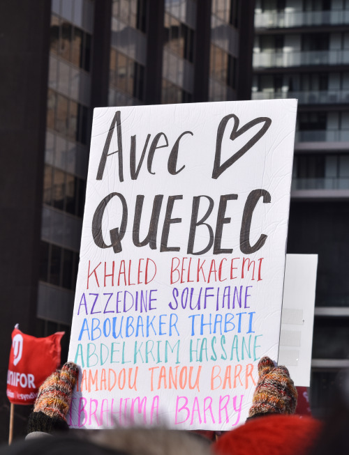 Signs from the National Day of Action against Islamophobia and White Supremacy in Toronto. Lots of c