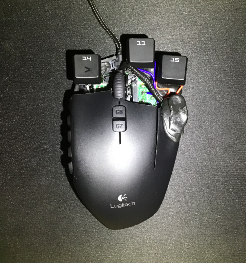 yournewkeyboard:“Modified Logitech G600 with MX Cherry Speed Switches” via u/MexPayneDive20 on Reddit.