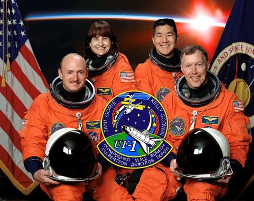 The core crew of STS-108, which delivered the crew of Expedition 4 to the ISS and brought the crew o