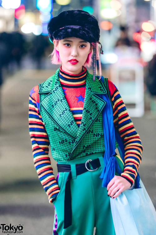 Pink-haired Rikarin on the street in Harajuku wearing layered resale tops from Kinji with RRR by Sug