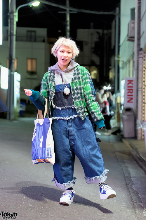 20-year-old Mari on the street in Harajuku tonight wearing a Facetasm plaid jacket over Nozomi Ishig