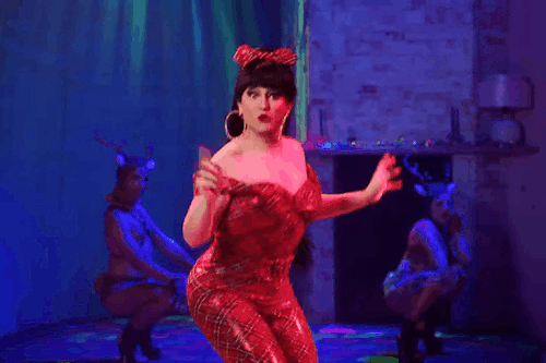 GIFset Of DeLa In The Tartan Pantsuit That Nobody Asked For