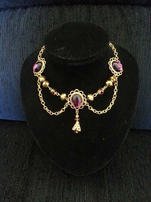 elvendesigns:  Gold tudor style necklace with amethyst stone settings also shown with bottle green stone settings and a ruby stone variation in and faceted blue glass in silver plate. 
