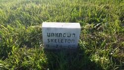 sixpenceee:  A picture of a strange gravestone posted by imgur user tekken  