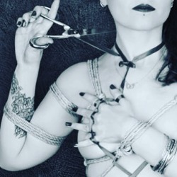 selinaminx:  Snip. #bondage #tattoo #dangerousbeauty 