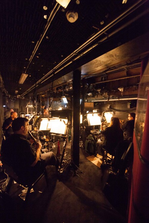 Pre-show warm up in the orchestra pit. Photo by maxgordonphotography.