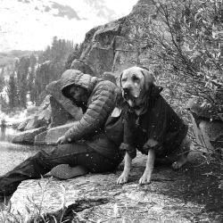 patagonia:  Fishing in the snow with dog,