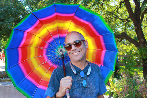 Please enjoy this photo of my dad and his umbrella.