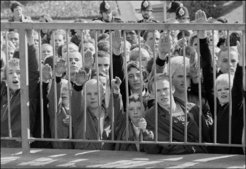 mondaymorningcenterback:  Skin head Chelsea fans give Nazi salutes during a 1980 match against Crystal Palace. Last night Chelsea fans reminded us that football is still rife with racism. 