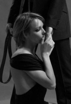 welldisciplinedwives: Kissing the hand of her loving disciplinarian. This photo makes me feel all soft and mushy inside!