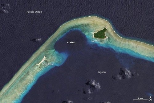 An island with a hole in itIn March of 1954 this island exploded. This is Bikini Atoll, site of many