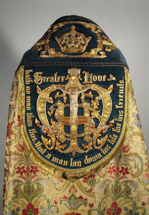 An assortment of copes, vestments worn by priests.