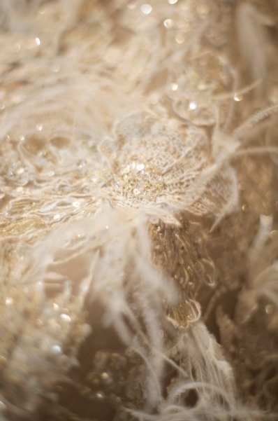 eliesaab:Ivory couture gowns dressed with lace and feathers, sequins and pearls.