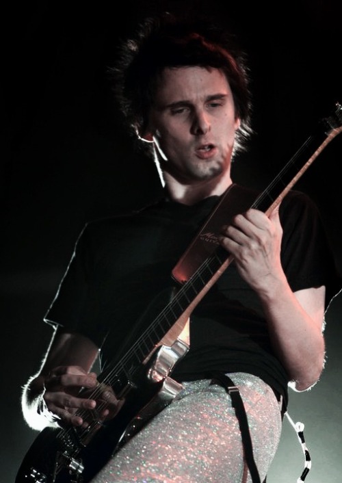 Matthew Bellamy performing at Les Eurockéennes, Belfort, France 2006those pants are covered in holog