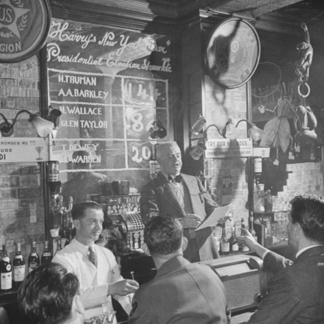 denizanders:  Man Reading About Election Straw Votes at Harry’s New York Bar, photo: Yale Joel Located in Paris, Harry’s New York Bar opened in 1911, and became a legitimate ex-pat cafe during the next decade, attracting Sinclair Lewis, Humphrey Bogart,