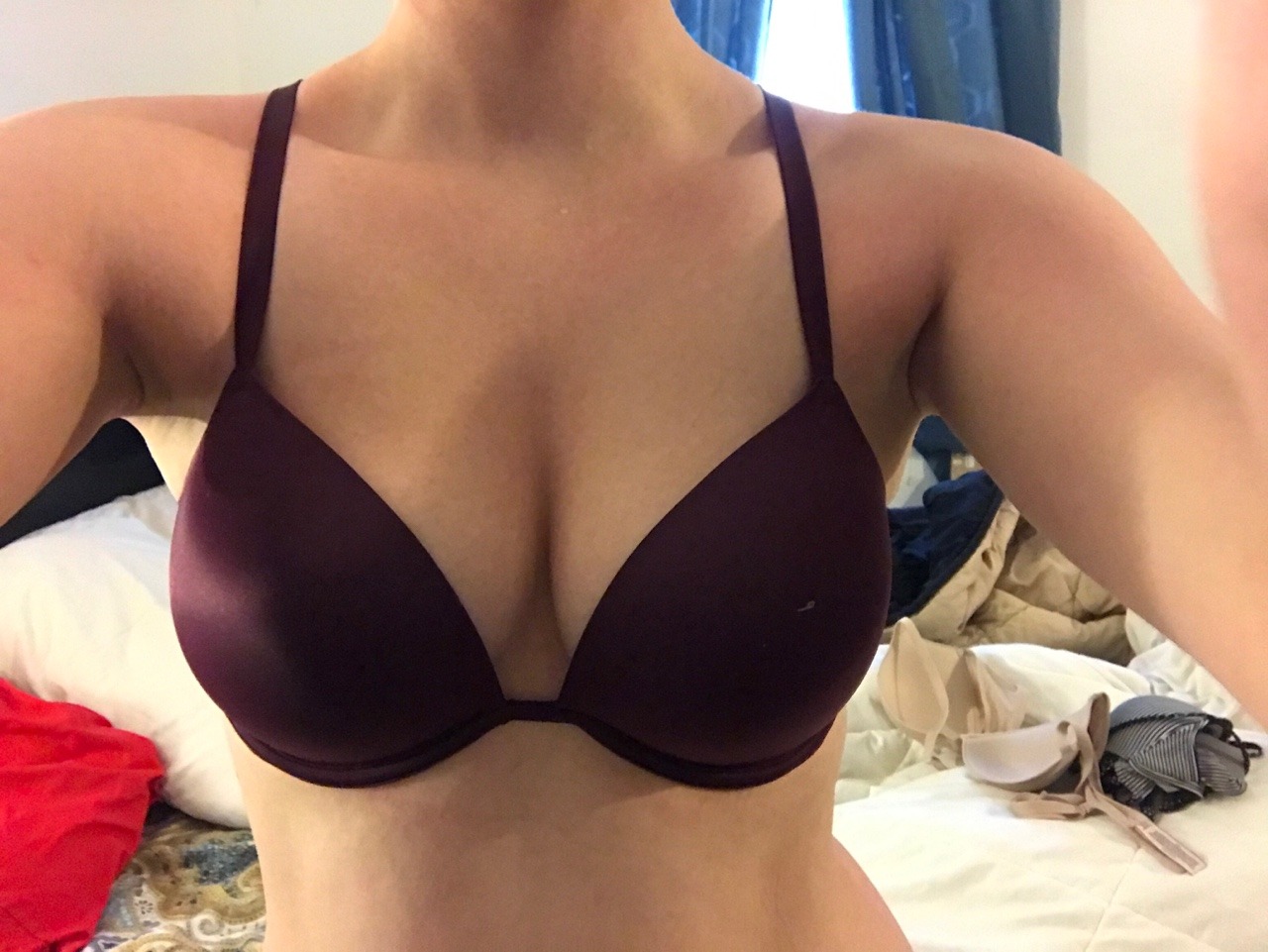 LETS TALK ABOUT TITTIES.  My bra size is between a 36C and a 34DD.  The number means